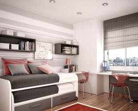 Выдвижная кровать в детской комнате для двух мальчиков